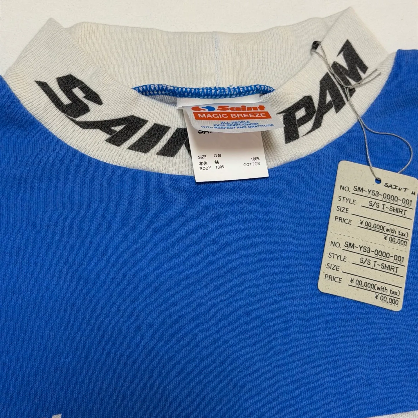 SAINT Mxxxxx Make the printing look distressed and white. Correct accessories. Customized co-branded model with P.A.M. wash mark.